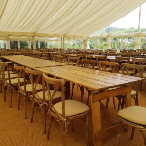 Rustic Crossback chairs and wooden trestles for hire