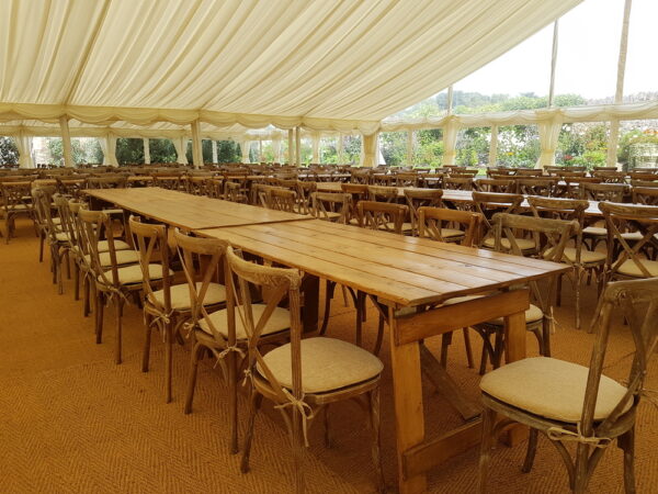 Rustic Crossback chairs and wooden trestles for hire