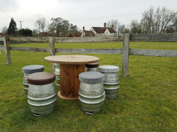 cable table and beer barrel seats