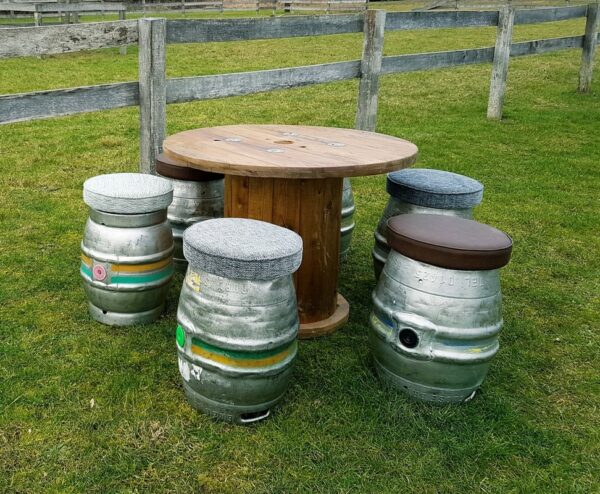 cable table and beer barrel seats