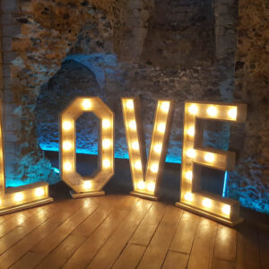 large LED LOVE sign rustic style
